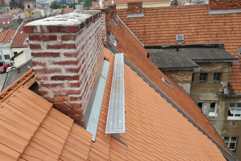 Rekonštrukcia strechy bytového domu Staré mesto, Podtatranského